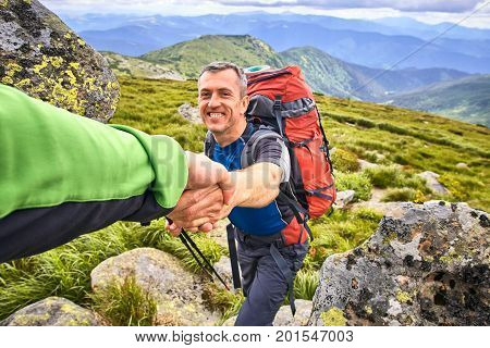 Hand of Help support and help in a dangerous situation.