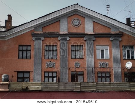 Kazakhstan, Ust-Kamenogorsk - 01, August 2017. A fragment of a house on Gogol street. Architecture. Architectural background. Antique architecture.