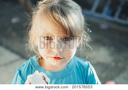 Beautiful Girl Five Years Eating Ice Cream In Nature