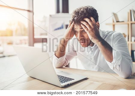 Young Businessman Working In Office