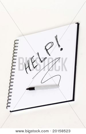pomoci rukou napsaný na cívku notebook