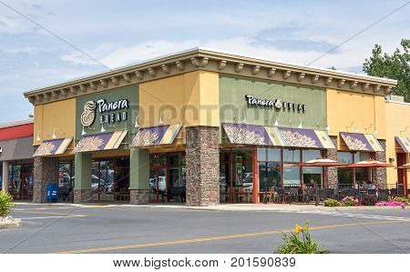 PLATTSBURGH USA - AUGUST 23 2017 : Panera Bread restaurant and logo. Panera Bread Company is an American chain of bakery-cafe fast casual restaurants in the United States and Canada.