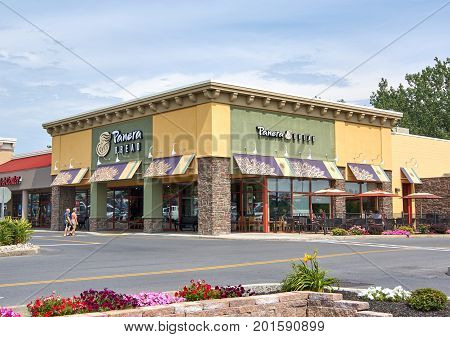 PLATTSBURGH USA - AUGUST 23 2017 : Panera Bread restaurant and logo. Panera Bread Company is an American chain of bakery-cafe fast casual restaurants in the United States and Canada.