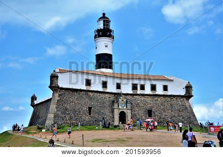 Salvador, Bahia, Brazil - February 27, 2013 - The Farol da Barra is located at Ponta de Santo Antônio, in Salvador. The lighthouse is built inside the Fort of Santo Antônio da Barra.