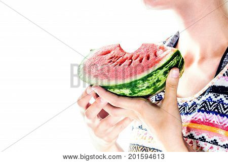 Slice of bite watermelon in woman hands on white background