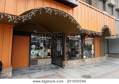 CADILLAC, MICHIGAN / UNITED STATES - MAY 31, 2017: One may drink coffee and eat home-made sweets at Simply Delightful, on Mitchell Street in downtown Cadillac.