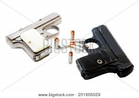 Two guns and and .23 caliber bullits. Isolated on a white background.