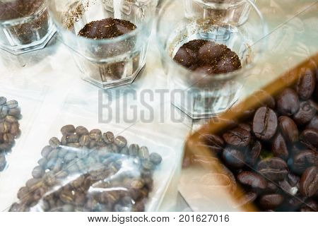 Glass Of Coffee For Taster To Smell And Taste Aromatic And Flavor Wheel. Aroma Perception In Brewed