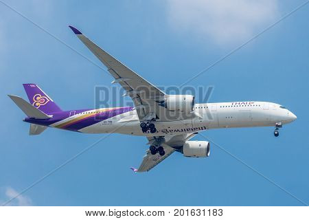 Bangkok, Thailand. - July 24, 2017 : Plane or aircraft of Thai Airways or Airlines on the sky landing to Suvanabhumi airport.
