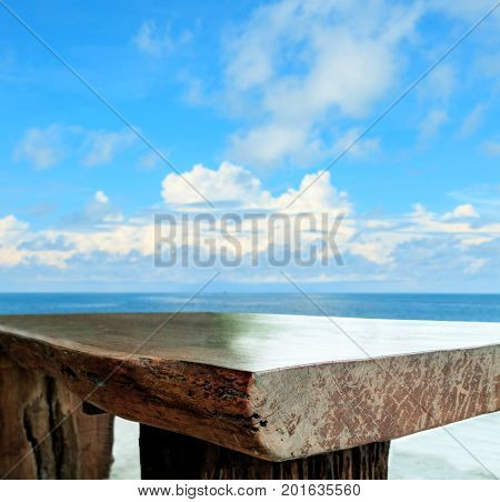 empty wood table top and beautiful blue sky background for display product