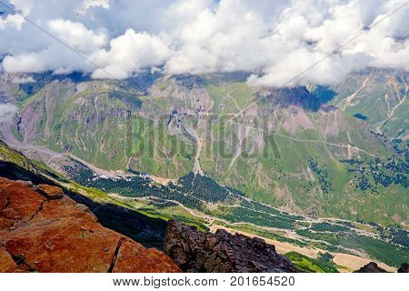 Amazing nature view of green mountain forest and tree growing on a rock, natural landscape perspective, Caucasus, Russia.