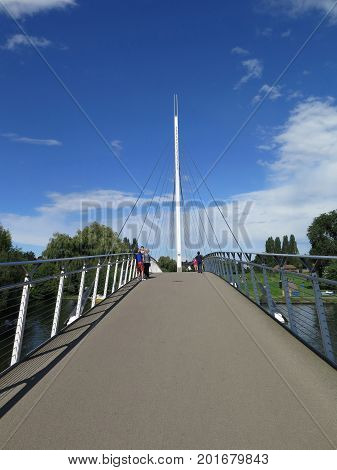People On Modern Foot Bridge