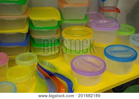 Reusable plastic container on the counter of the store