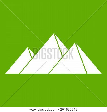 Pyramids in Giza icon white isolated on green background. Vector illustration