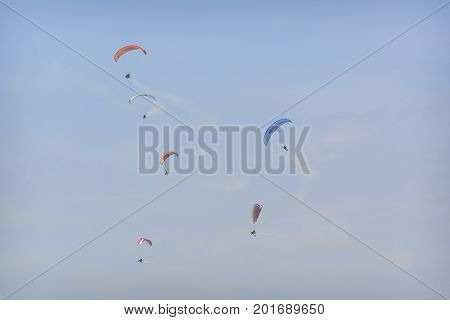 Radom, Poland - August 26, 2017 :the Flying Dragons Aerobatic Group Of Paramotor Flying In The Air S
