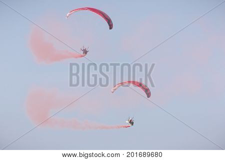 Radom, Poland - August 26, 2017 :the Flying Dragons Aerobatic Group Of Paramotor Flying In The Air S