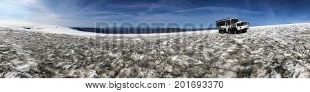 Husafell Iceland August 22 2017: Specialty vehicle for driving on the snow stands on the surface of Langjokull glacier. This is a part of 