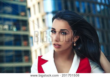 A Brunette Woman With Long Hair In Fashionable Creative Colored Dresses Posing Outdoors. Fashion Pho