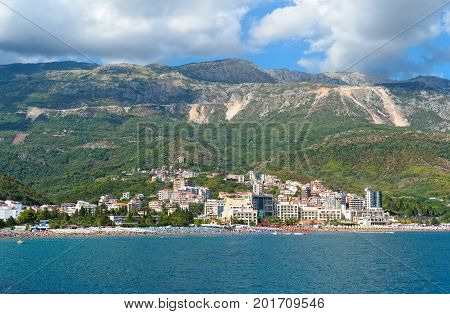 MONTENEGRO, BECICI - 12 AUGUST, 2017: View from the sea to the beaches and hotels of the Budva Riviera in the resort town of Becici