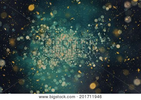 Christmas background with glitter lights. Defocused abstract texture