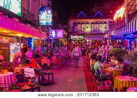 Pattaya, Thailand -March 6, 2017: Walking Street in Pattaya at night. The street is a tourist attraction primarily for night life and entertainment.