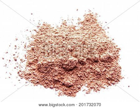 Сrumbled natural powder make up on white background. Face powder texture.