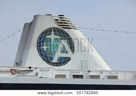 Velsen The Netherlands - June 20th 2017: Azamara Journey - Azamara Club Cruises on North Sea Channel detail of funnel