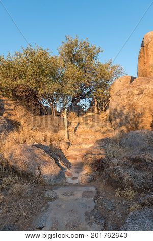 A trail and steps at the Hoada Rest Camp in the Kunene Region of Namibia at sunset