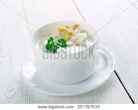 Thick smoked-haddock chowder , close up traditional meal