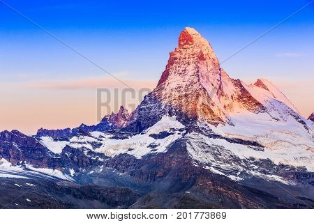 Zermatt Switzerland. East and north faces of the Matterhorn at sunrise.