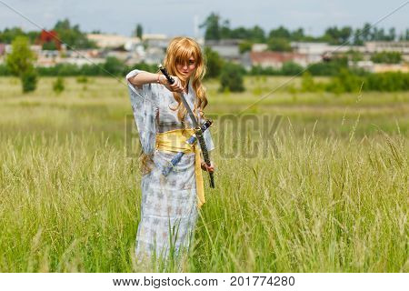Portrait Of Samurai Girl With A Sword
