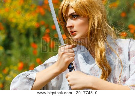 Portrait Of Samurai Girl With A Sword