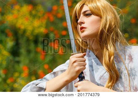 Portrait Of Samurai Girl With A Sword