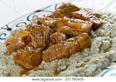 Meat On A Bed Of Baked Eggplant