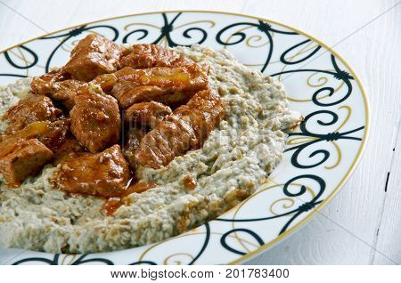 Meat On A Bed Of Baked Eggplant