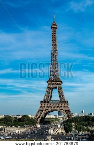 Paris France - August 13 2016: The Eiffel Tower (Tour Eiffel) is a wrought iron lattice tower (324m) on the Champ de Mars in Paris France. It is named after the engineer Gustave Eiffel whose company designed and built the tower.