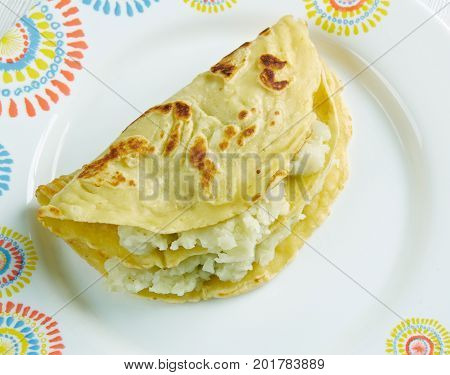 Qistibi. Roasted Flatbreads With Potatoes