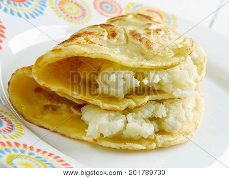 Qistibi - popular traditional dish in Tatarstan and Bashkortostan.roasted flatbreads with various fillings inside