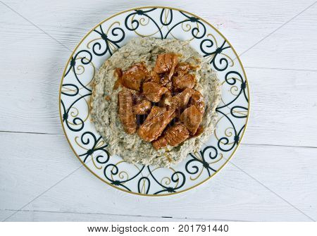Meat On A Bed Of Baked Eggplant