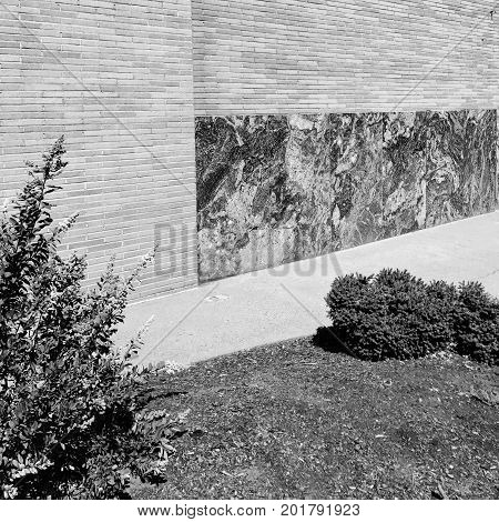 Beautiful marble panel on the side of a building in downtown Prineville in Central Oregon on a sunny summer day.