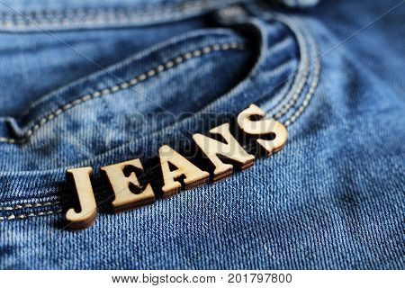 Wooden Letters And Jeans