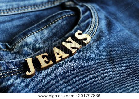 Wooden Letters And Jeans
