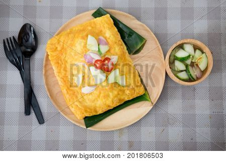 Vietnamese stuffed crispy egg omelet crispy crepe in Thai call Kanom Buang Yuan or banh xeo