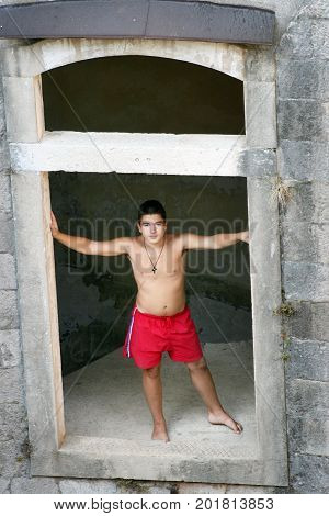 Handsome boy posing at Fort Mamula, Montenegro