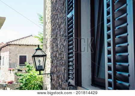 Old narrow street in Stari Grad of Ulcinj Montenegro. The fortress in the Old town in a sunny summer day.