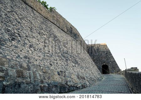 Main entrance to the Stari Grad of Ulcinj Montenegro. The gate of fortress in the Old town in a sunny summer day.