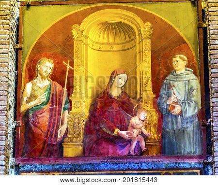 ROME, ITALY - January 19, 2017 Madonna of Clemency 15th Century Painting Pantheon Rome Italy Rebuilt by Hadrian in the Second Century Became oldest church in 609 AD Mary Baby Jesus Between John the Baptist and St Francis