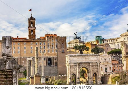 Roman Forum Septemus Severus Arch Capatoline Hill ColumnsRome Italy. Forum rebuilt by Julius Ceasar in 46 BC