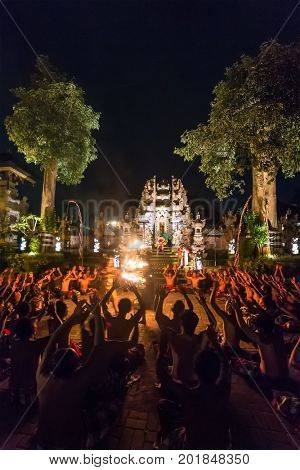 Ubud, Indonesia - August 8, 2016: Traditional Kecak Fire Dance ceremony in Hindu temple.