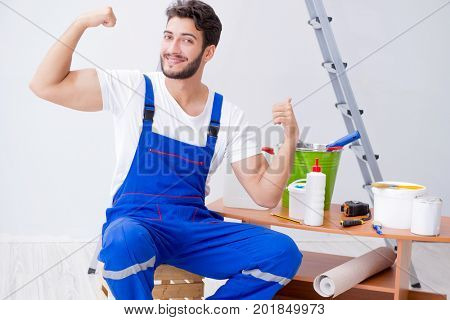 Repairman doing renovation repair in the house with paper wallpa